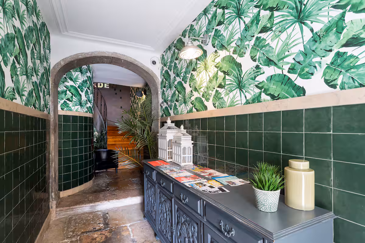 Botanical entrance hall with green tiles