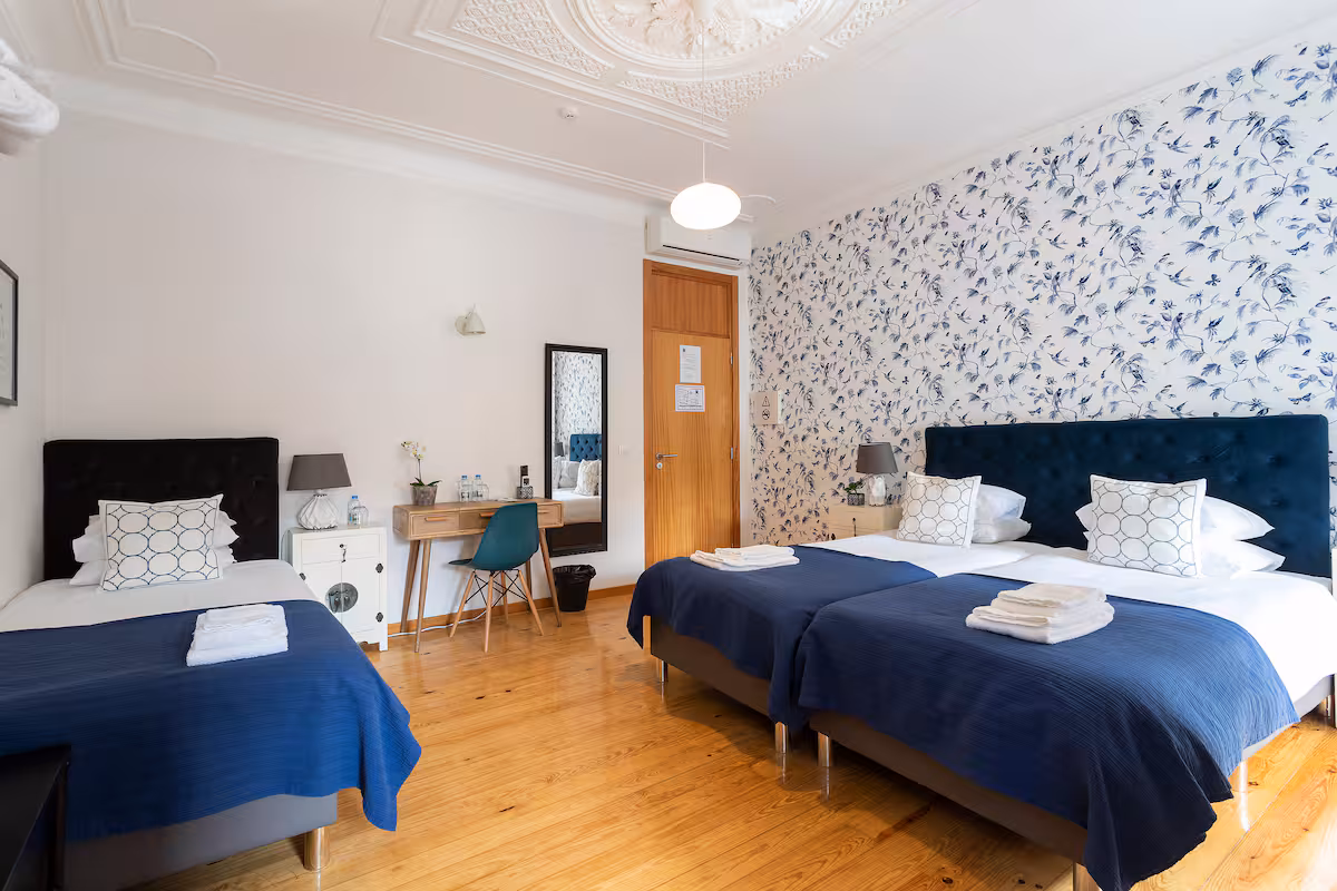 Triple room with blue decor